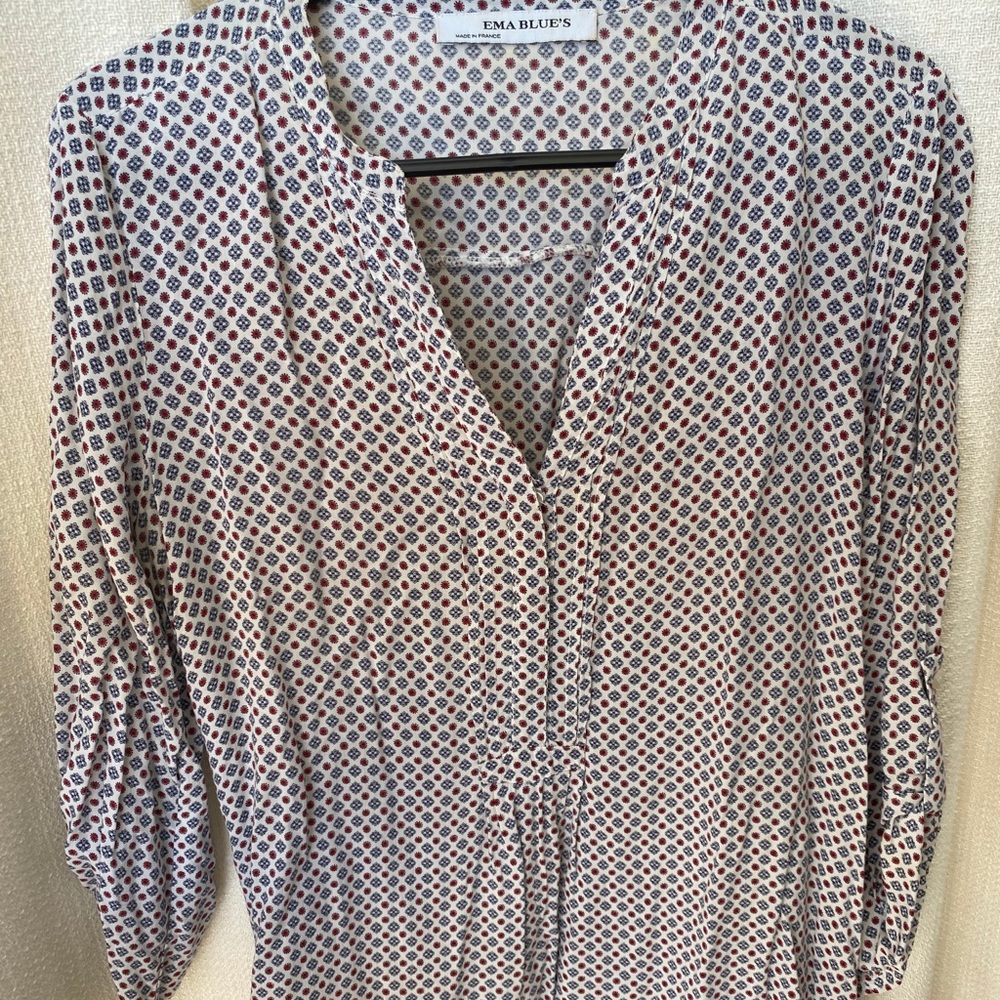 Beautiful white blouse with red and blue details